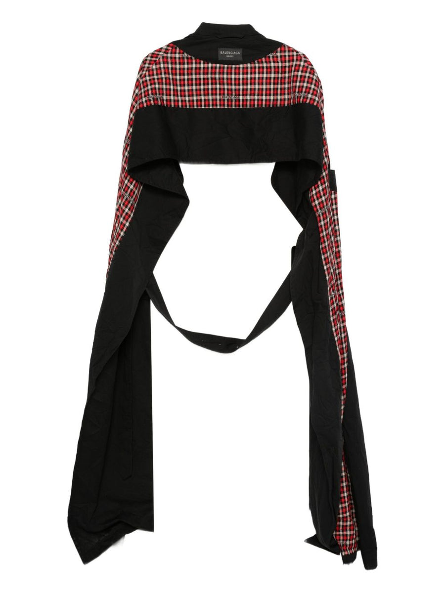 Close-up of Balenciaga outerwear hardware and fine stitching
