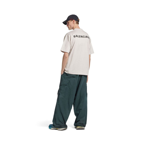 Close-up of Balenciaga pants hardware and fine stitching