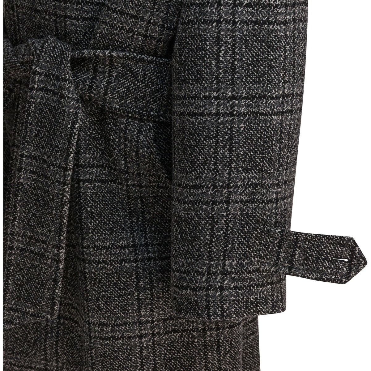 Close-up of Balenciaga outerwear hardware and fine stitching
