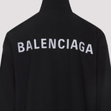 Close-up of Balenciaga outerwear hardware and fine stitching