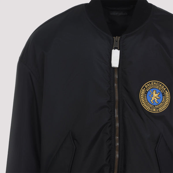 Close-up of Balenciaga outerwear hardware and fine stitching