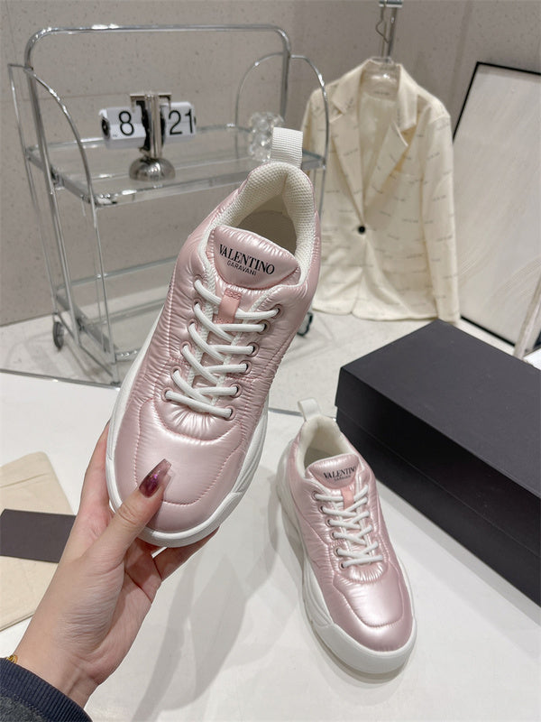 Three-quarter angle view of Valentino Garavani luxury piece style No.182