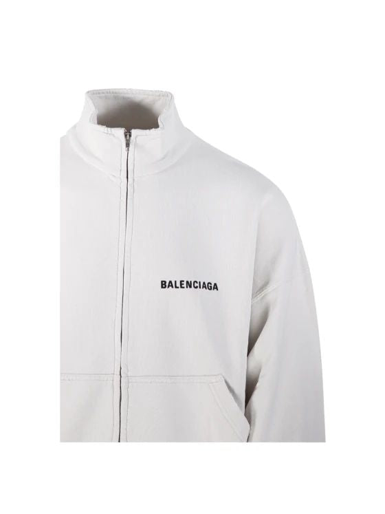 Close-up of Balenciaga outerwear hardware and fine stitching