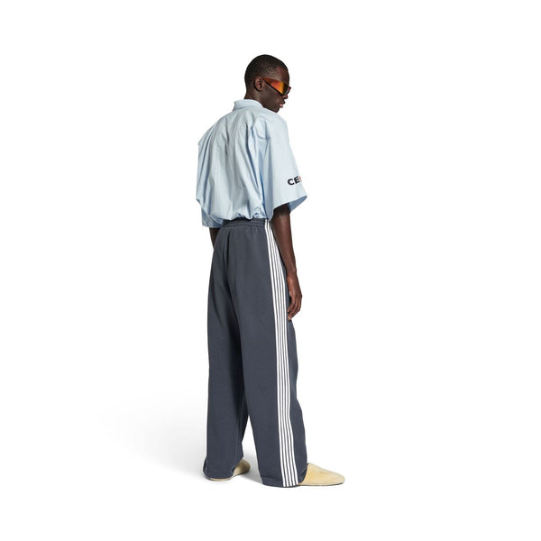 Close-up of Balenciaga pants hardware and fine stitching