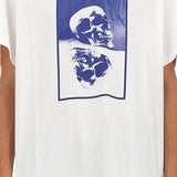 Close-up of Alexander McQueen tee shirts hardware and fine stitching