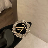 Louis Vuitton Beige Ankle Strap Heels - Angled View