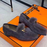 Hermès White Chelsea Boots - Close-Up Texture View