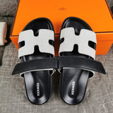 Hermès Red Crisscross Strap Sandals - Angled View