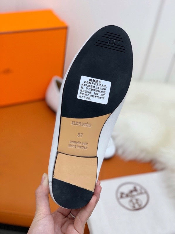 Hermès White Ankle Boots - Angled View