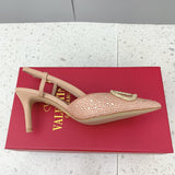 Three-quarter angle view of Valentino Garavani luxury piece style No.237
