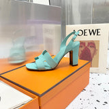 Hermes sandals Style 144 - angled studio shot