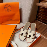 Hermes sandals Style 069 - styled lifestyle view