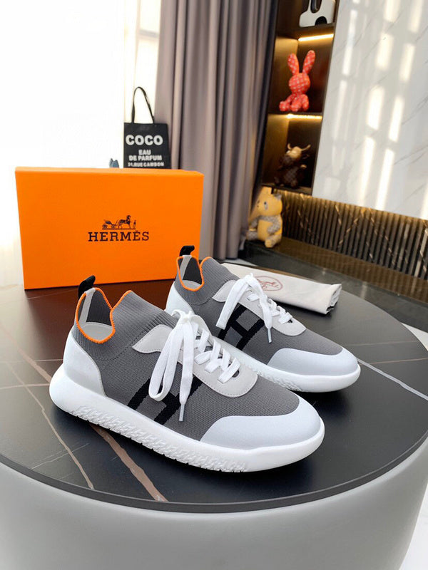Hermès Beige Slip-On Sneakers - Angled View