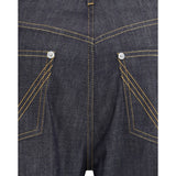 Close-up of Bottega Veneta pants hardware and fine stitching
