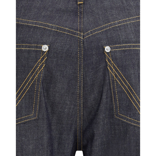 Close-up of Bottega Veneta pants hardware and fine stitching