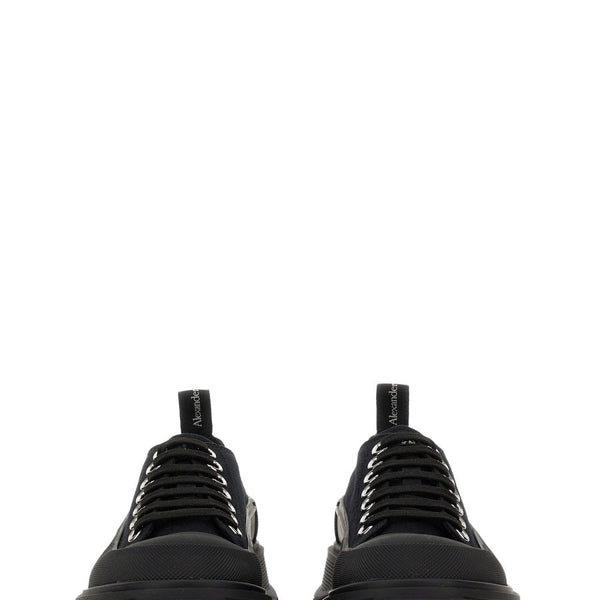 Close-up of Alexander McQueen athletic hardware and fine stitching