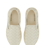 Close-up of Bottega Veneta athletic hardware and fine stitching