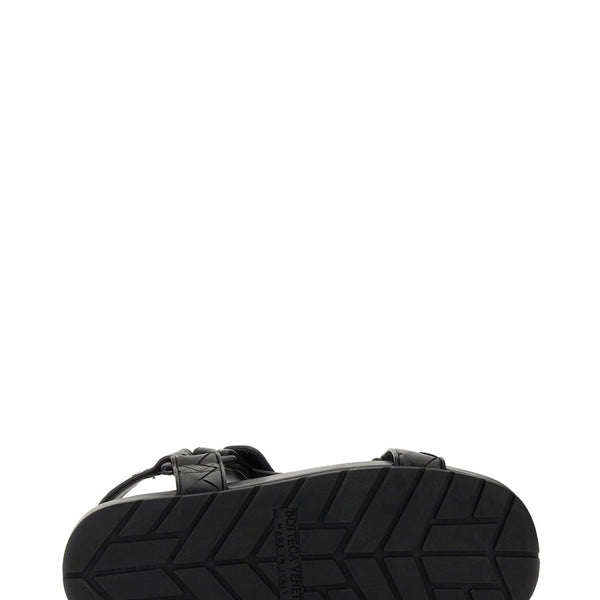 Close-up of Bottega Veneta sandals hardware and fine stitching