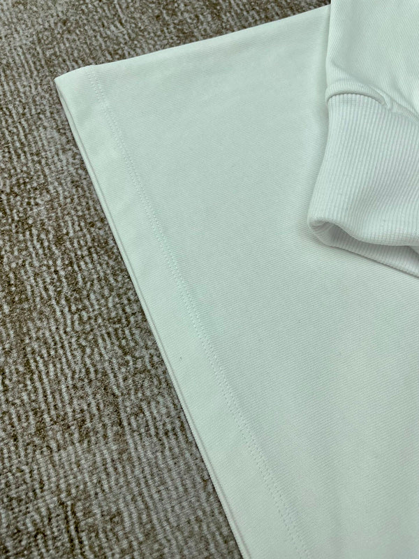 Three-quarter angle view of Amiri luxury piece style No.063