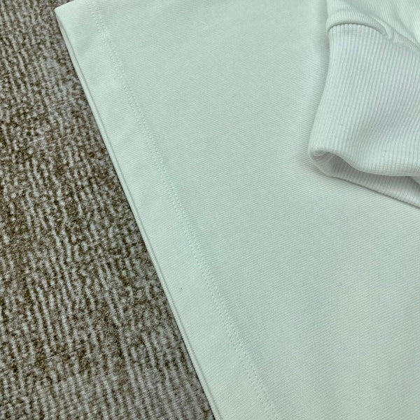 Three-quarter angle view of Amiri luxury piece style No.063