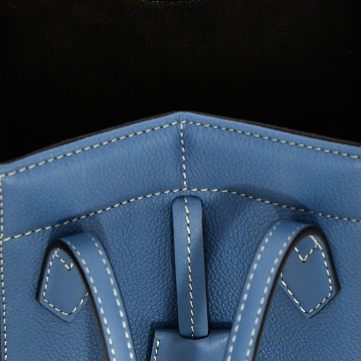 Close-up of Fendi cross body bags hardware and fine stitching