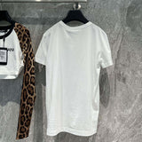 Dolce & Gabbana T-Shirt flat lay on neutral background