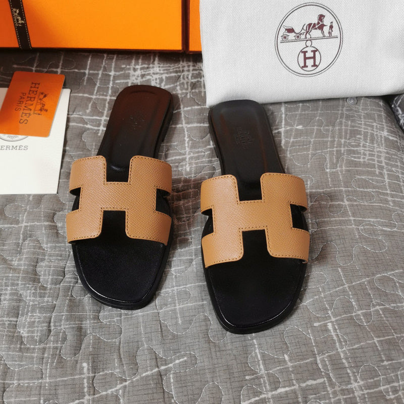 Hermès Black Gladiator Sandals - Lifestyle Styling Shot