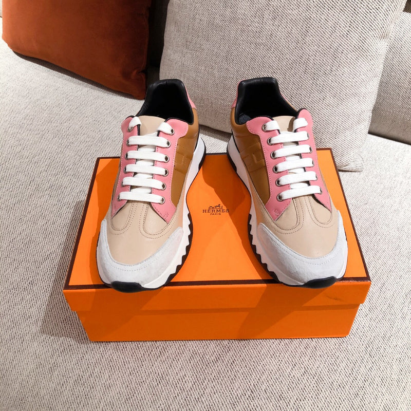 Hermès White High-Top Sneakers - Close-Up Texture View
