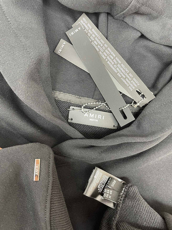 Three-quarter angle view of Amiri luxury piece style No.035
