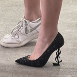 Side profile view of Saint Laurent luxury piece style No.064