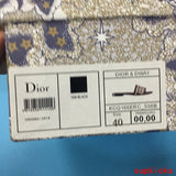 Dior shoes Style 033 - close-up of iconic logo design (alternate angle)