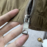 Texture and finish detail of Burberry luxury piece style No.408