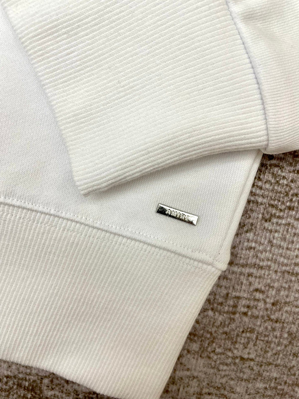 Texture and finish detail of Amiri luxury piece style No.120