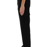Close-up of Alexander McQueen pants hardware and fine stitching