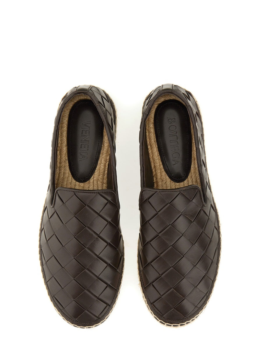 Bottega Veneta slides lifestyle shot premium designer piece