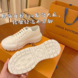 Louis Vuitton Black High-Top Sneakers - Heel Detail View
