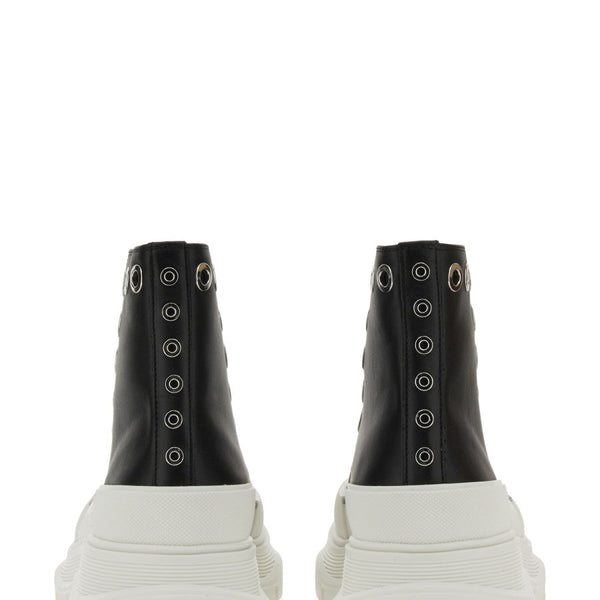 Alexander McQueen premium athletic detail and craftsmanship close-up