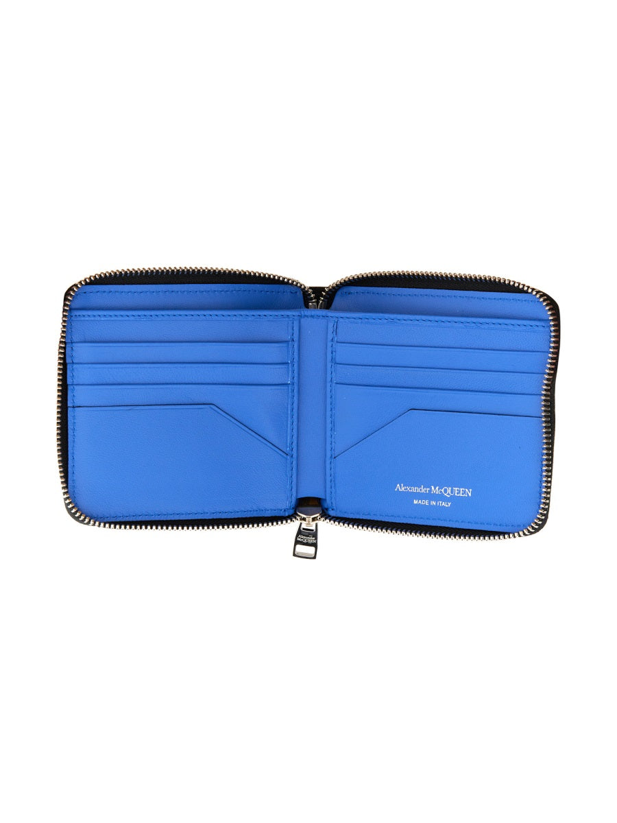 Close-up of Alexander McQueen wallets hardware and fine stitching