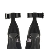 Close-up of Alexander McQueen pumps hardware and fine stitching