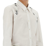Close-up of Alexander McQueen blouses hardware and fine stitching