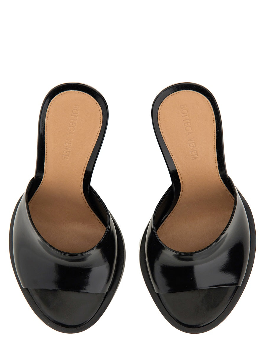 Close-up of Bottega Veneta pumps hardware and fine stitching