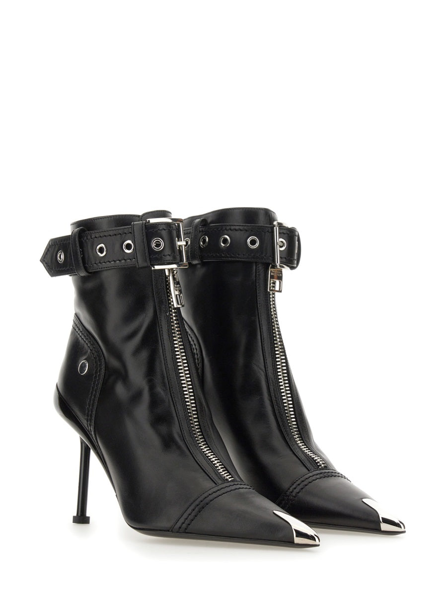 Close-up of Alexander McQueen boots & booties hardware and fine stitching