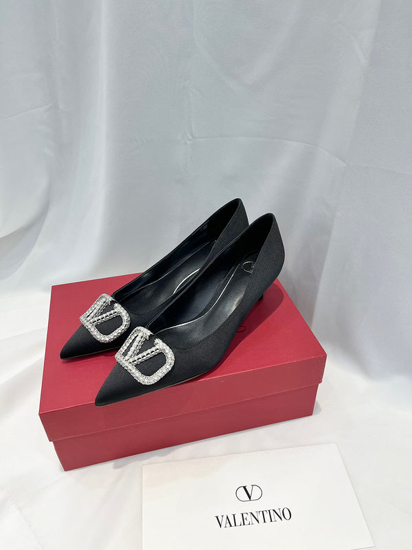 Styling view of Valentino Garavani luxury piece style No.216