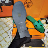 Hermes sandals Style 057 - angled studio shot