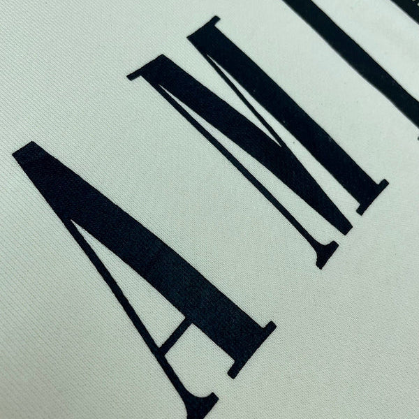 Three-quarter angle view of Amiri luxury piece style No.078