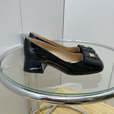 Side profile view of Miu Miu luxury piece style No.107