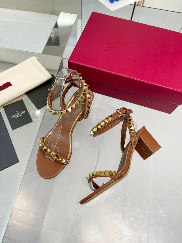 Three-quarter angle view of Valentino Garavani luxury piece style No.229