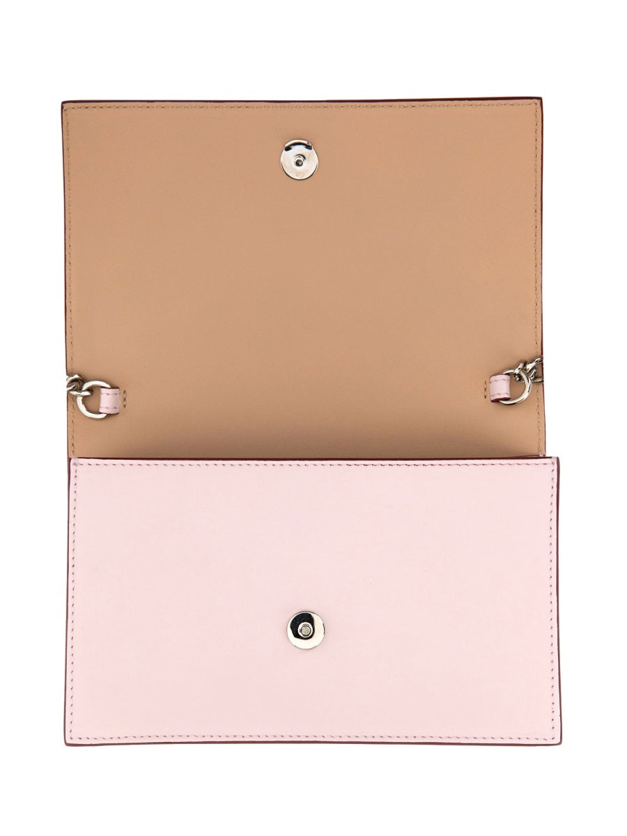 Alexander McQueen cross body bags side profile designer luxury fashion