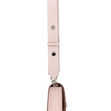 Close-up of Alexander McQueen cross body bags hardware and fine stitching