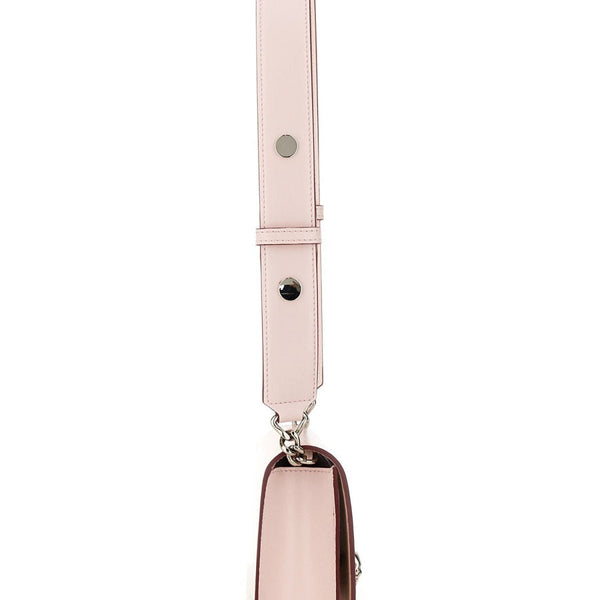 Close-up of Alexander McQueen cross body bags hardware and fine stitching